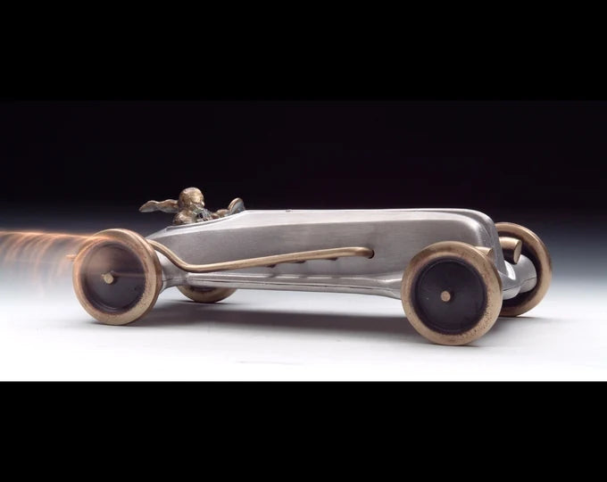 Vintage-style car model on a dark background